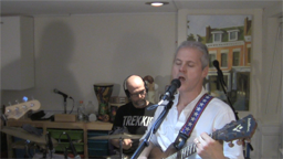 Drummer Dave Blakeslee in the background